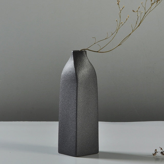 Elevate The Look of Your Space with the Timeless Elegance of the Black Glaze Vase!