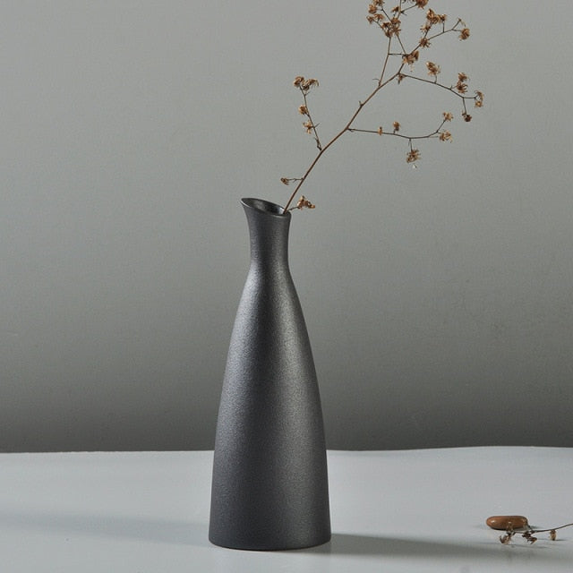 Elevate The Look of Your Space with the Timeless Elegance of the Black Glaze Vase!